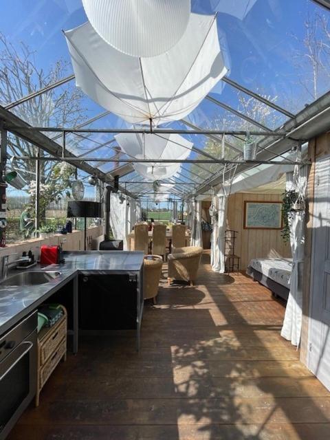 Vrijstaande Accommodatie Glamping De Kas Inn Hank Bagian luar foto